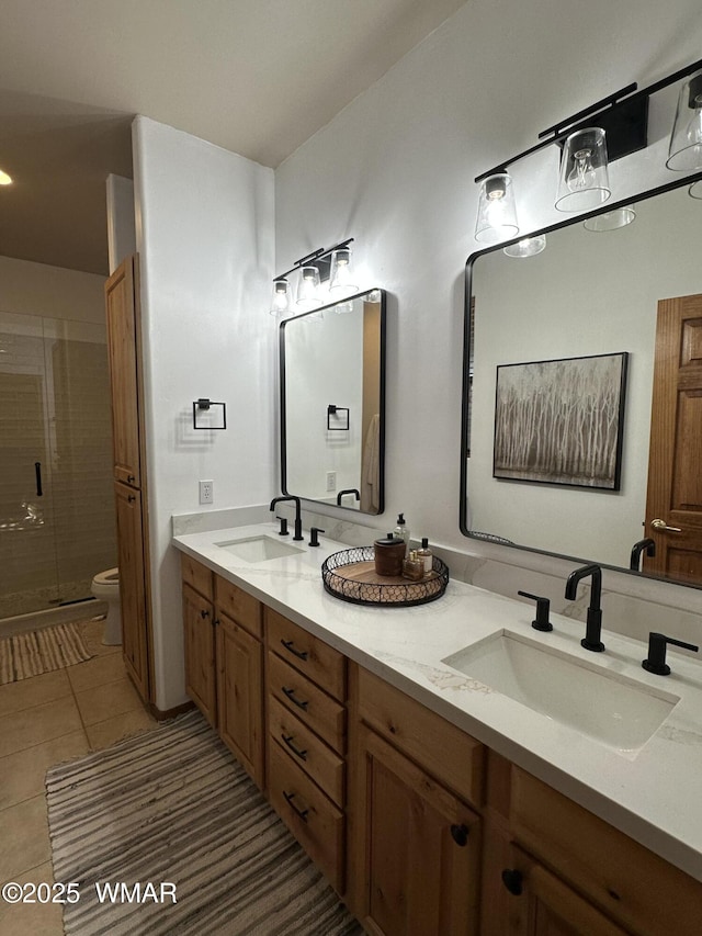 1401 S Spruce Ln, Show Low, AZ 85901 - bathroom featuring double vanity, toilet, a stall shower, and tile patterned floors