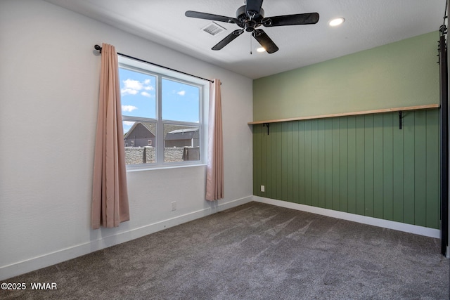 1738 W 7th St, Snowflake, AZ 85937 - empty room featuring dark colored carpet, ceiling fan, recessed lighting, and baseboards
