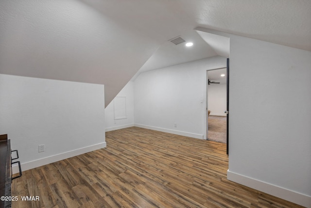 1738 W 7th St, Snowflake, AZ 85937 - bonus room with lofted ceiling, wood finished floors, and baseboards