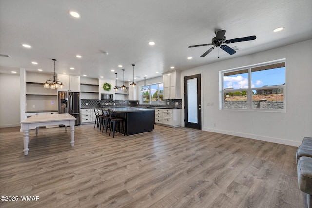 1738 W 7th St, Snowflake, AZ 85937 - living area featuring recessed lighting, baseboards, light wood-style flooring, and ceiling fan