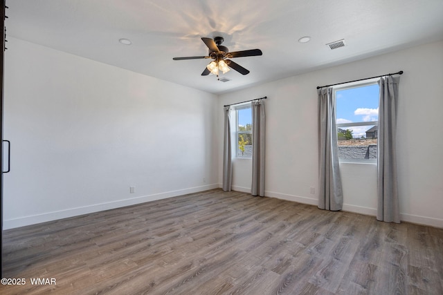 1738 W 7th St, Snowflake, AZ 85937 - empty room featuring ceiling fan, wood finished floors, baseboards, and recessed lighting