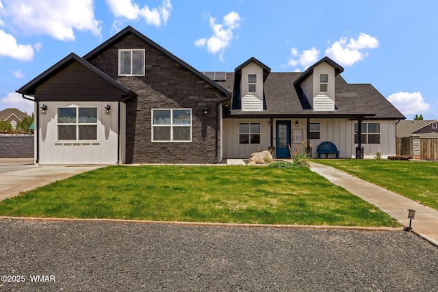 1738 W 7th St, Snowflake, AZ 85937 - view of front of house featuring board and batten siding, a front lawn, roof mounted solar panels, roof with shingles, and stone siding