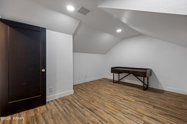 1738 W 7th St, Snowflake, AZ 85937 - additional living space featuring vaulted ceiling, wood finished floors, baseboards, and recessed lighting