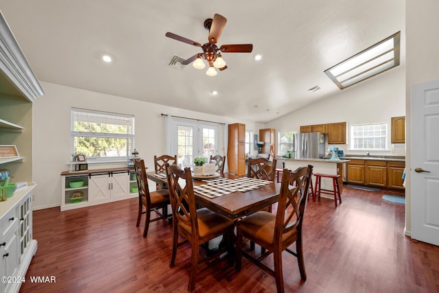 dining room featuring lofted ceiling, dark wood-style flooring, visible vents, and recessed lighting