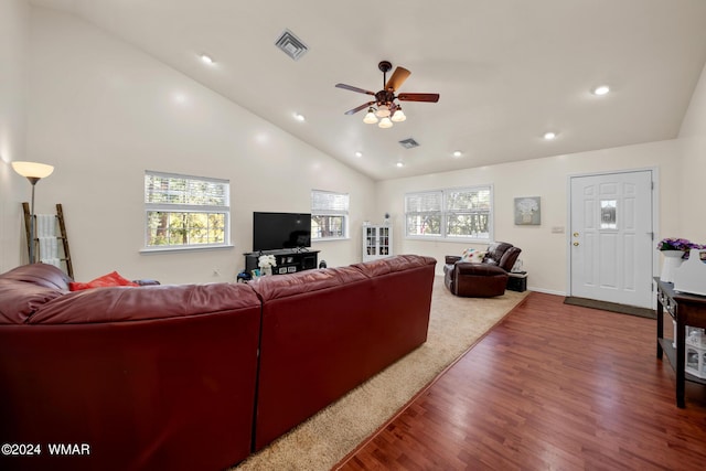 living room with plenty of natural light, wood finished floors, visible vents, and recessed lighting