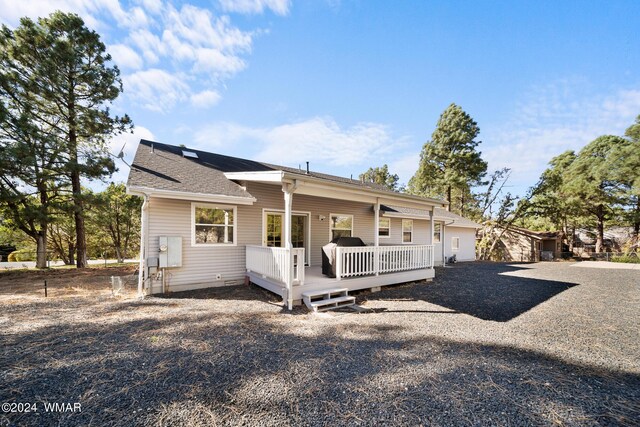 view of front of home with a deck