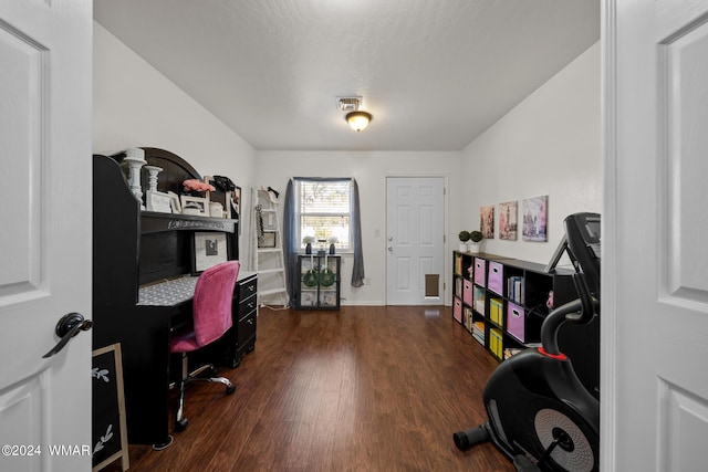 office space with dark wood-style floors and visible vents