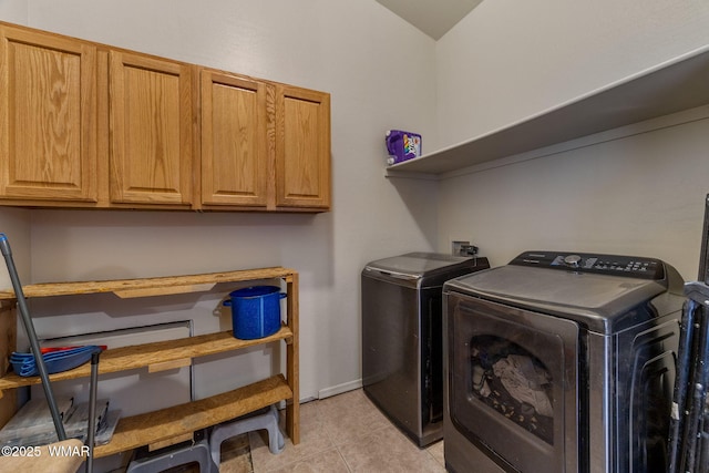 529 Foothills Blvd, Snowflake, AZ 85939 - laundry room with washing machine and dryer, cabinet space, and light tile patterned flooring