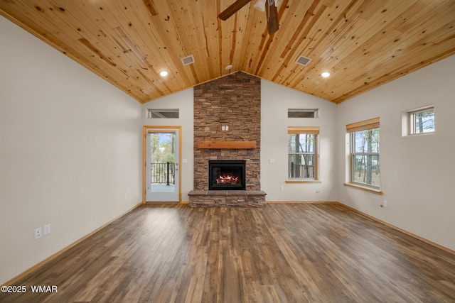 unfurnished living room featuring a fireplace, wooden ceiling, wood finished floors, and visible vents