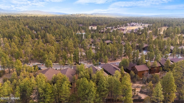 aerial view featuring a forest view