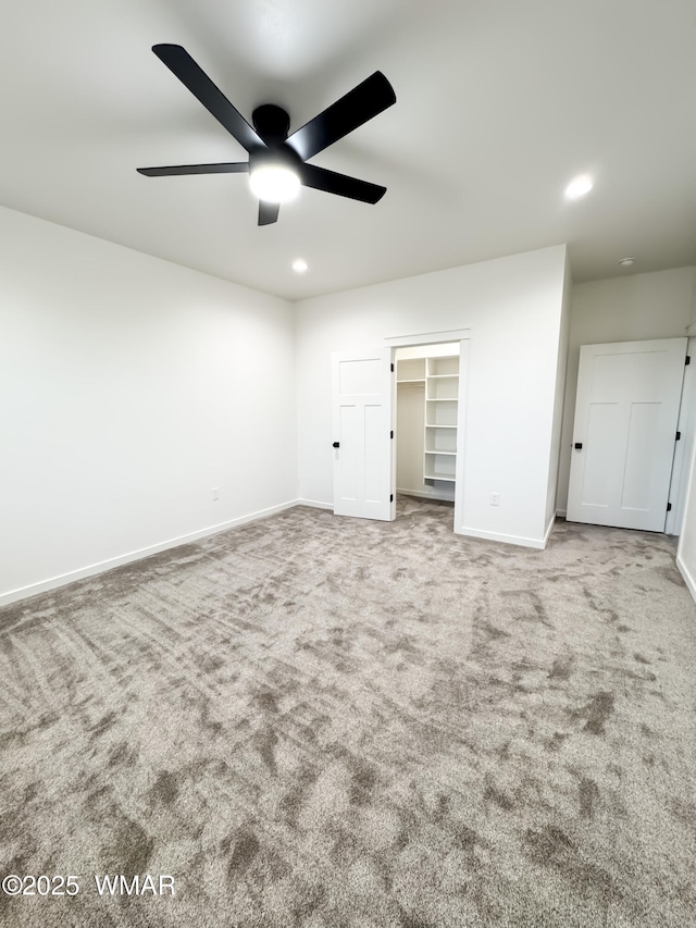 1316 W 7th St S, Snowflake, AZ 85937 - unfurnished bedroom with carpet floors, baseboards, recessed lighting, a walk in closet, and a ceiling fan
