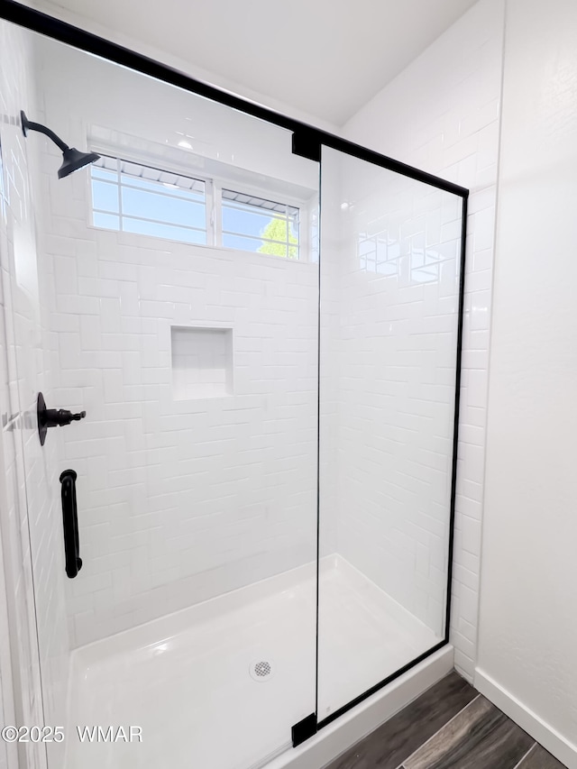 1316 W 7th St S, Snowflake, AZ 85937 - bathroom with a shower stall, wood finished floors, healthy amount of natural light, and baseboards
