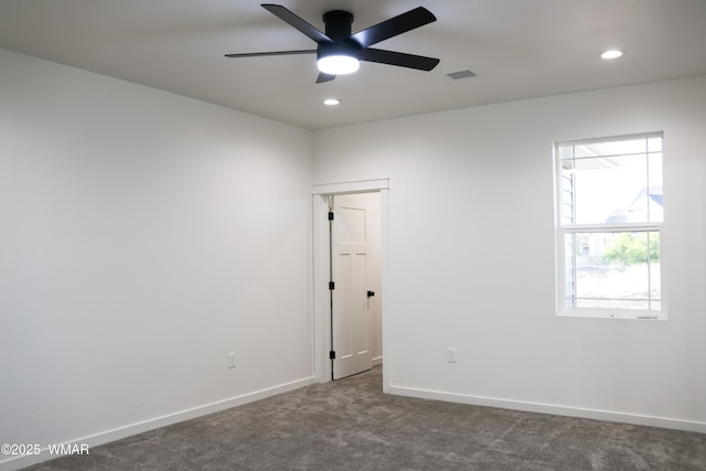 1316 W 7th St S, Snowflake, AZ 85937 - unfurnished room featuring dark colored carpet, ceiling fan, recessed lighting, and baseboards