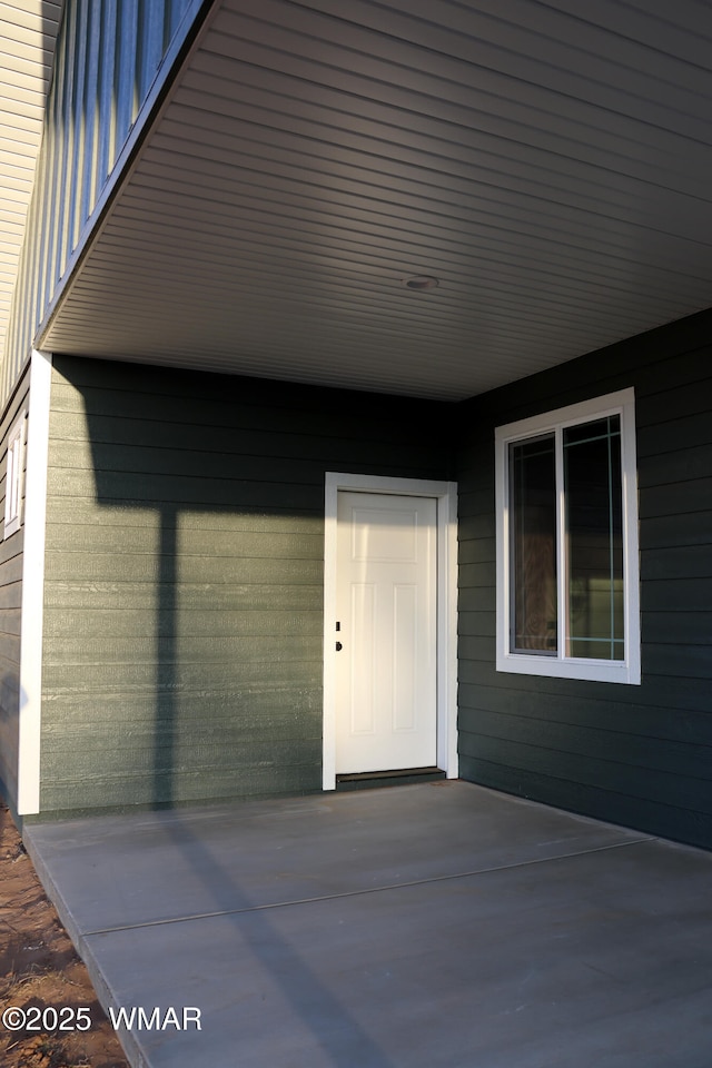 1316 W 7th St S, Snowflake, AZ 85937 - view of exterior entry featuring a patio