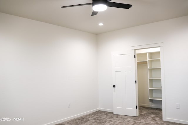 1316 W 7th St S, Snowflake, AZ 85937 - unfurnished bedroom with carpet, a walk in closet, baseboards, a closet, and ceiling fan