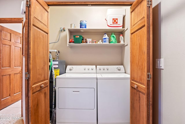 2740 W Maple Ln, Show Low, AZ 85901 - laundry room featuring light tile patterned floors, laundry area, and independent washer and dryer