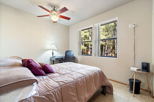 2740 W Maple Ln, Show Low, AZ 85901 - bedroom with baseboards, a ceiling fan, and carpet flooring