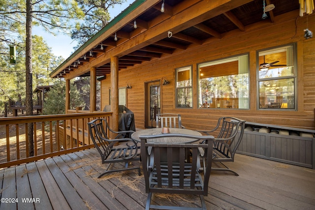 2740 W Maple Ln, Show Low, AZ 85901 - wooden deck with outdoor dining area and grilling area