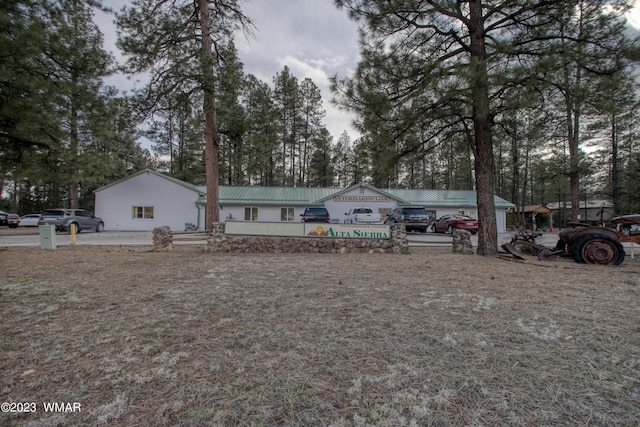 view of front of property featuring metal roof