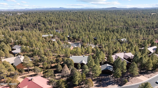 aerial view with a forest view and a mountain view