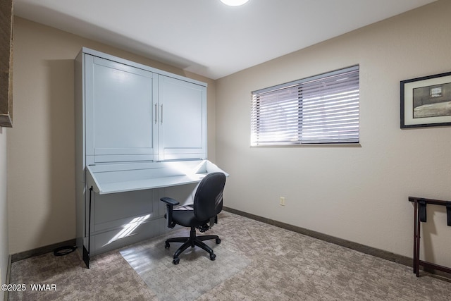 office space featuring baseboards