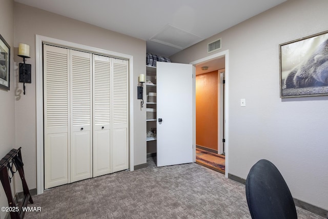 home office with carpet floors, baseboards, and visible vents