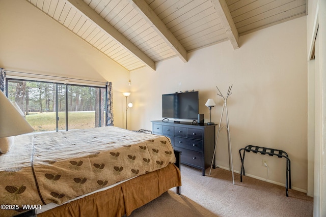 carpeted bedroom featuring wooden ceiling, lofted ceiling with beams, and baseboards