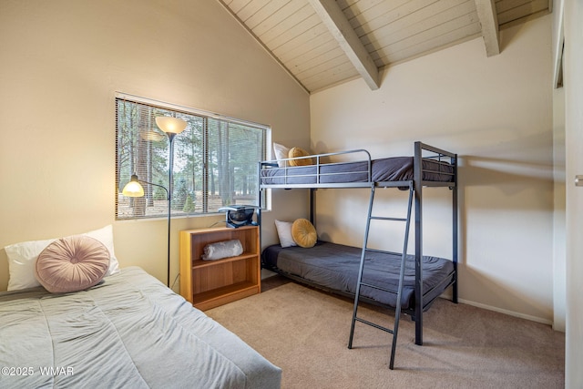 bedroom with carpet floors, high vaulted ceiling, wooden ceiling, beamed ceiling, and baseboards