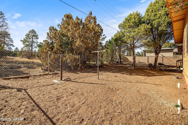 view of yard with fence