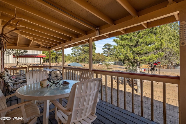 deck with outdoor dining space