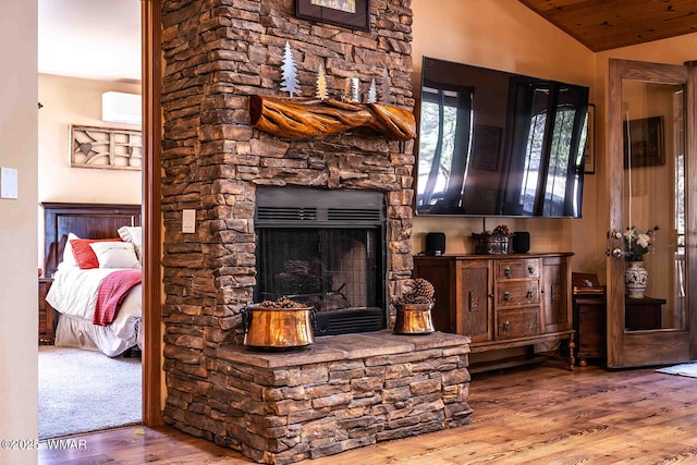 6757 Cheney Ranch Loop, Show Low, AZ 85901 - living area with lofted ceiling, wood finished floors, a fireplace, and wood ceiling