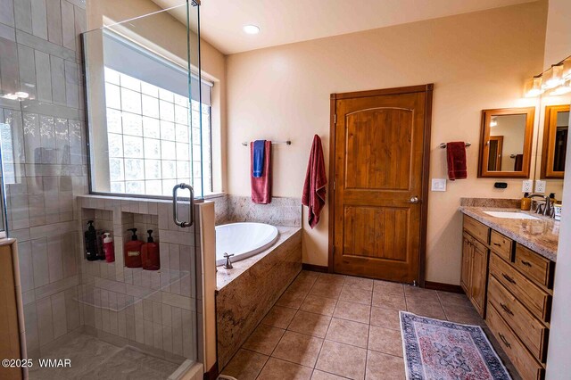 6757 Cheney Ranch Loop, Show Low, AZ 85901 - full bathroom featuring a bath, vanity, tile patterned flooring, and a stall shower