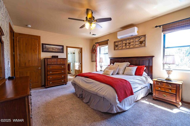 6757 Cheney Ranch Loop, Show Low, AZ 85901 - carpeted bedroom featuring a wall mounted AC, ensuite bathroom, and ceiling fan