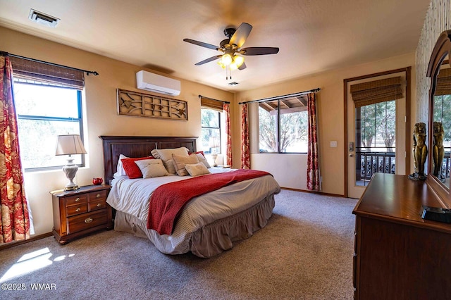 6757 Cheney Ranch Loop, Show Low, AZ 85901 - bedroom with a wall mounted air conditioner, access to exterior, light colored carpet, and a ceiling fan