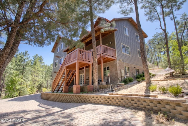 2020 S Pleasantview Dr, Show Low, AZ 85901 - rear view of property featuring a deck, stairway, and a patio area