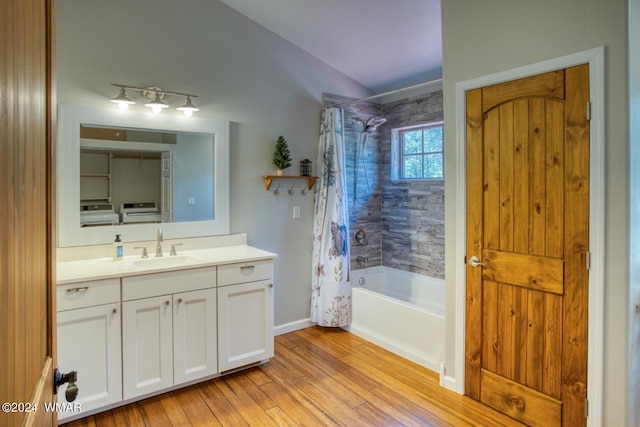 2020 S Pleasantview Dr, Show Low, AZ 85901 - full bath with vanity, wood finished floors, washer and dryer, shower / bath combo, and baseboards