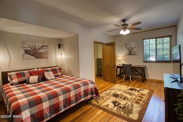 2020 S Pleasantview Dr, Show Low, AZ 85901 - bedroom featuring wood-type flooring and an office area