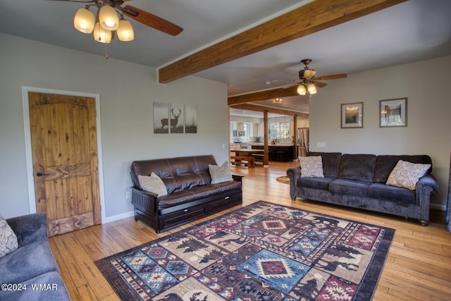2020 S Pleasantview Dr, Show Low, AZ 85901 - living area featuring ceiling fan, hardwood / wood-style floors, beamed ceiling, and baseboards