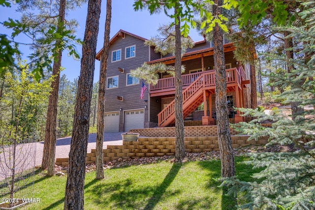 2020 S Pleasantview Dr, Show Low, AZ 85901 - chalet / cabin with driveway, stairs, a garage, and a front yard