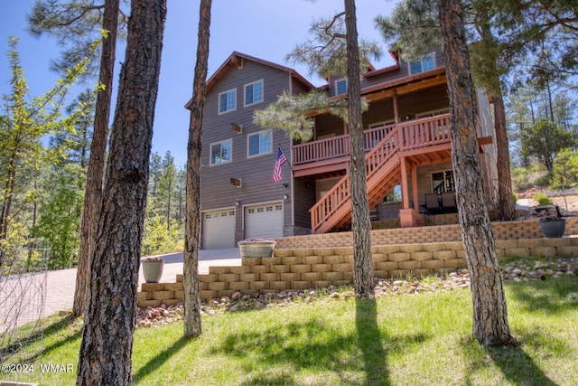 2020 S Pleasantview Dr, Show Low, AZ 85901 - view of front of property featuring stairs, concrete driveway, a garage, and a wooden deck