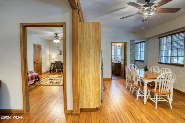 2020 S Pleasantview Dr, Show Low, AZ 85901 - dining space featuring ceiling fan, light wood-style floors, and baseboards