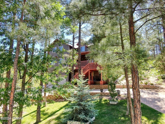 2020 S Pleasantview Dr, Show Low, AZ 85901 - view of front of property featuring stairway, a front lawn, and a deck