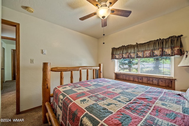bedroom with ceiling fan and carpet flooring