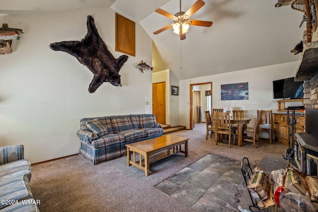 living room featuring ceiling fan, dark colored carpet, high vaulted ceiling, and baseboards