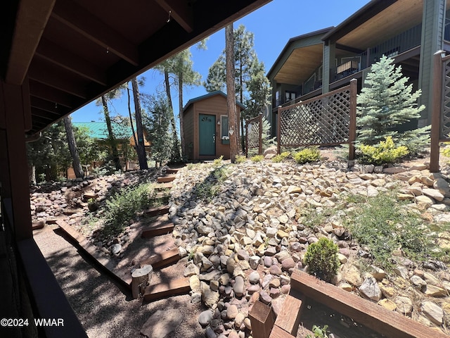 view of patio / terrace with an outbuilding