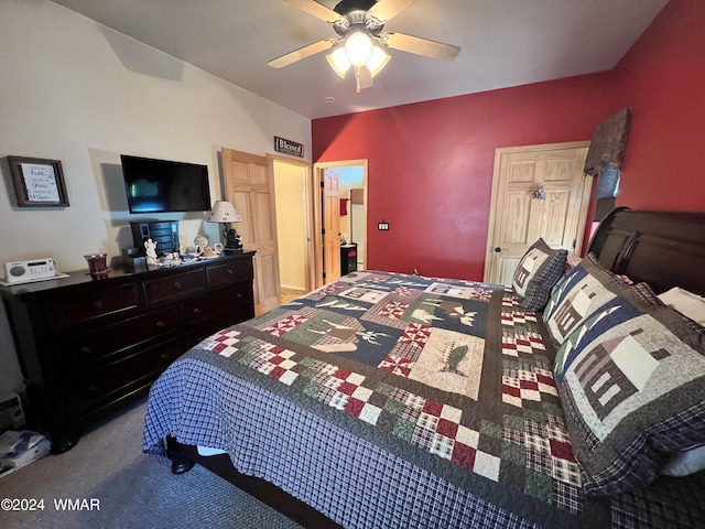 carpeted bedroom featuring a ceiling fan