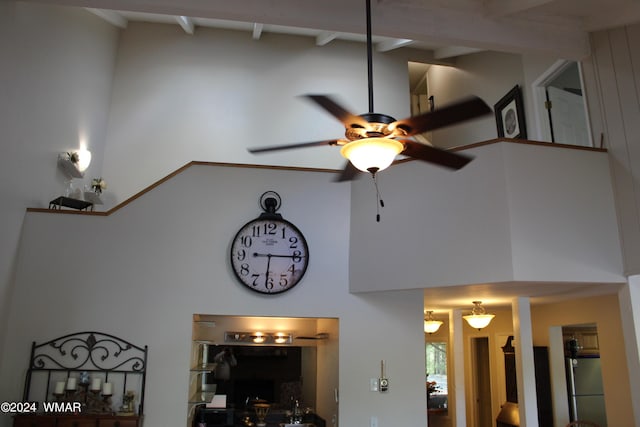 details featuring freestanding refrigerator and a ceiling fan