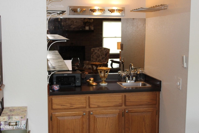 bar featuring a sink