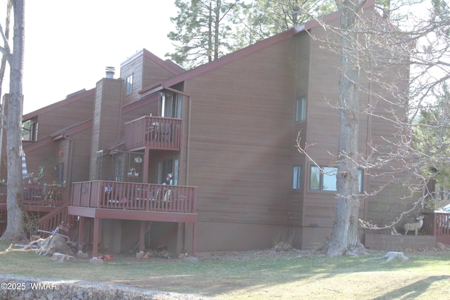 view of home's exterior featuring a chimney