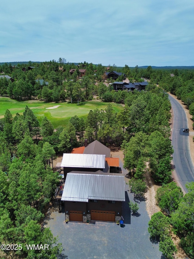 bird's eye view with view of golf course
